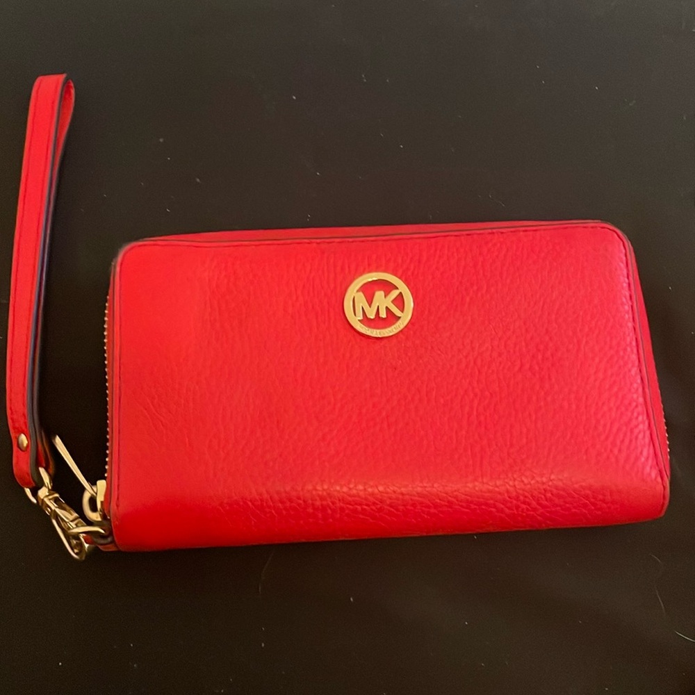 Michael Kors wallet / wristlet.  Beautiful color and great size.